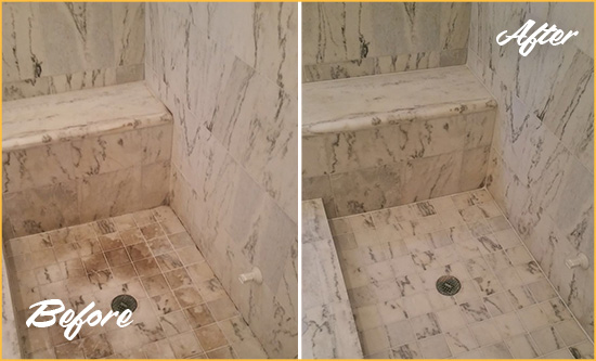 Before and After Picture of a Dirty Clayton Marble Shower Cleaned to Eliminate Dark Stains