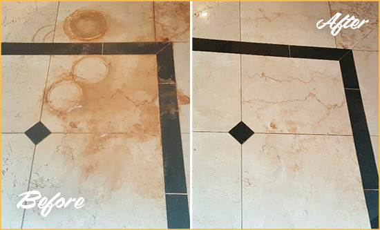 Before and After Picture of a New Castle Marble Floor Cleaned to Eliminate Rust Stains