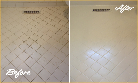 Before and After Picture of a Pike Creek White Bathroom Floor Grout Sealed for Extra Protection
